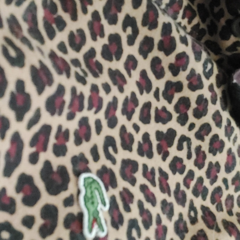 Lacoste big cat maxamilist collared sweat shirt. So rare. Maybe even endangered
